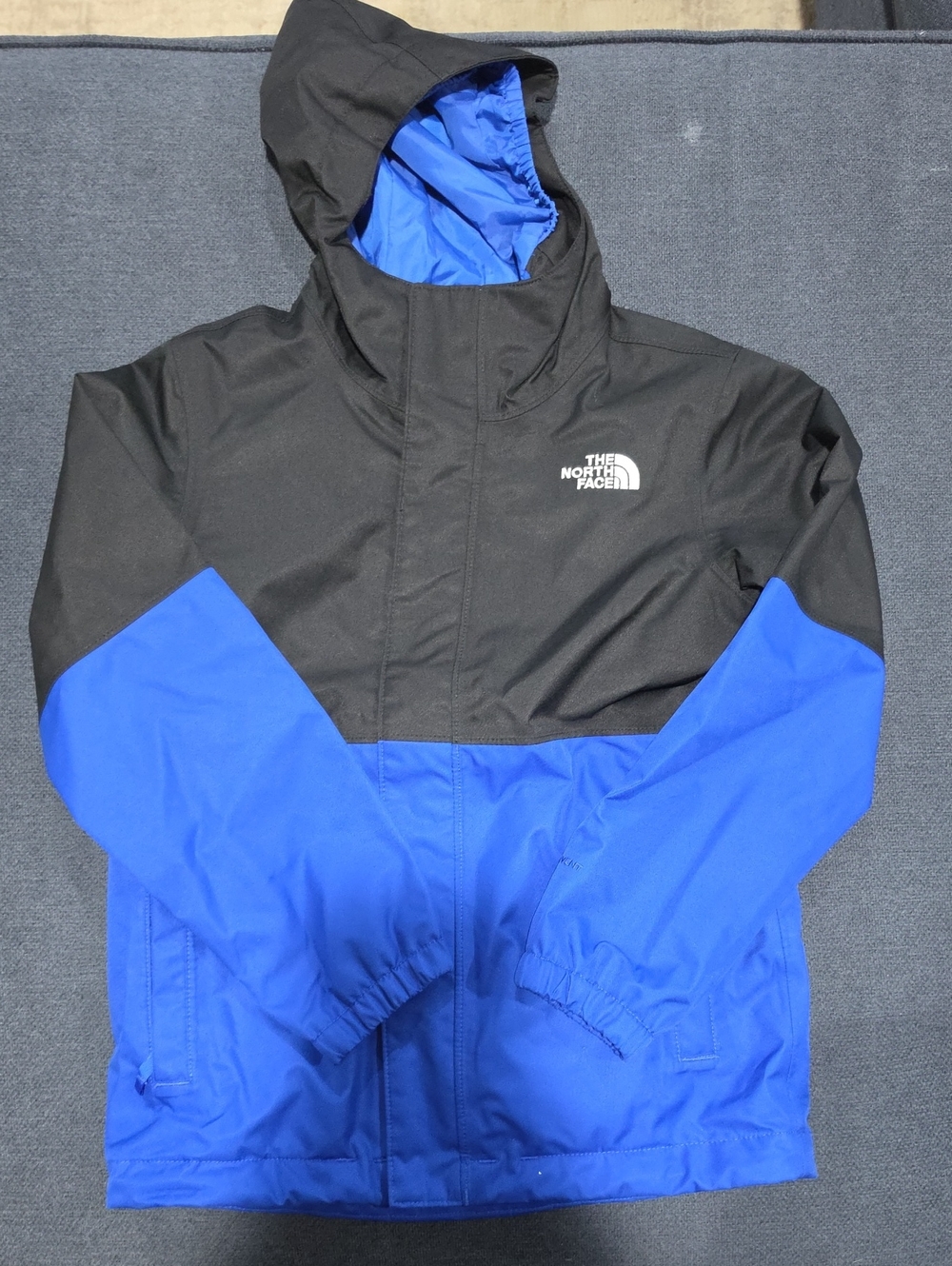 The North Face Black and Royal Blue Hooded Jacket with Fleece Liner